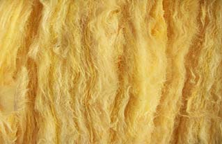 Утепление вентилируемых фасадов стекловолокном.